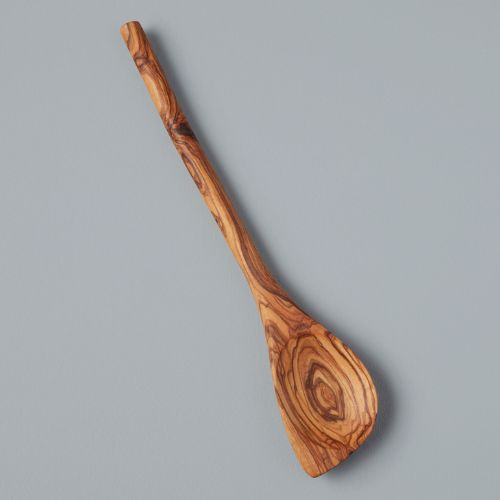 Grande spatule en bois d'olivier sur fond gris