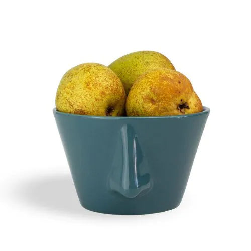 Bol bleu vert avec des poires dedans