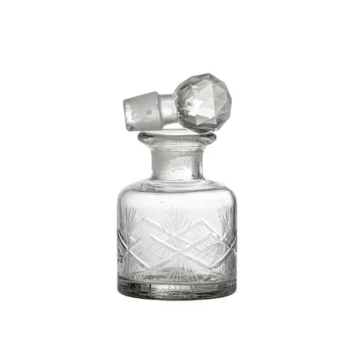 Bouteille en verre à effet cristal avec un capuchon ouvert